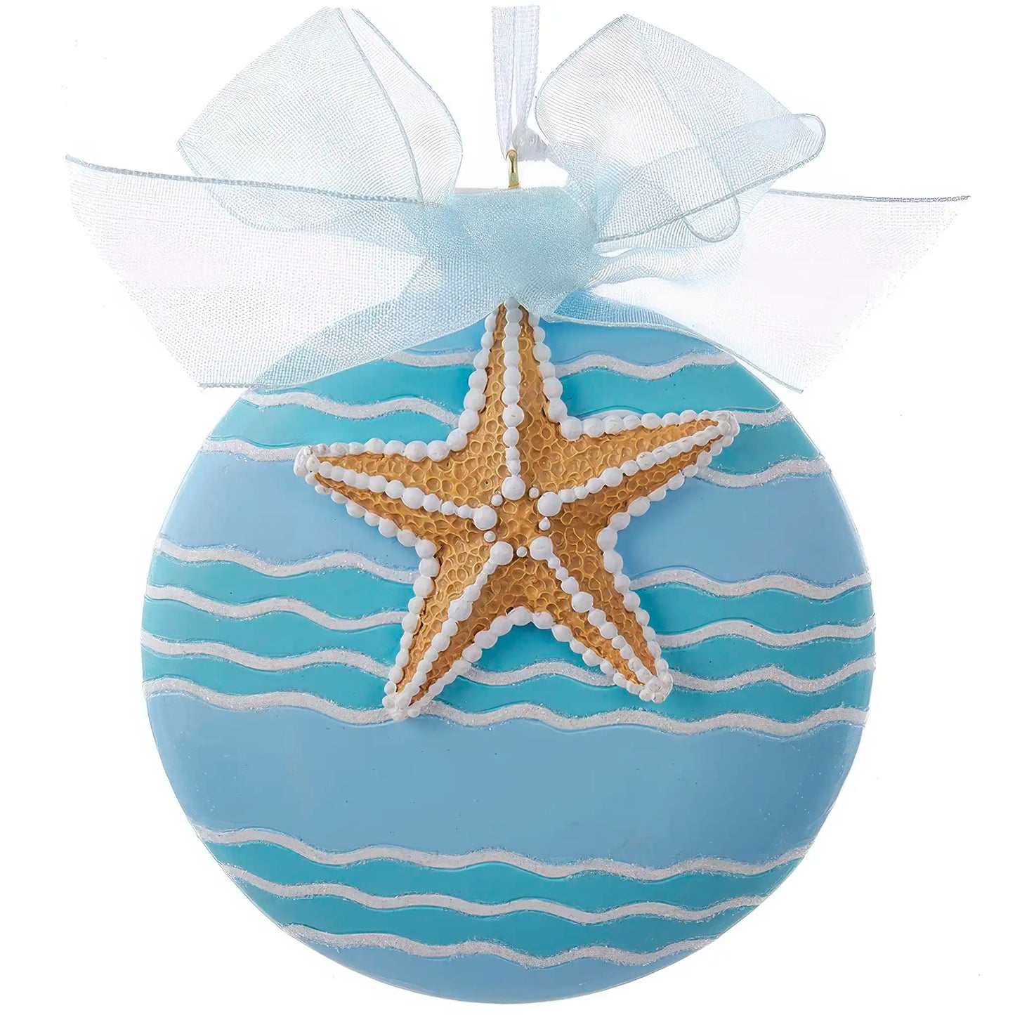 Adorno navideño de estrella de mar en la playa