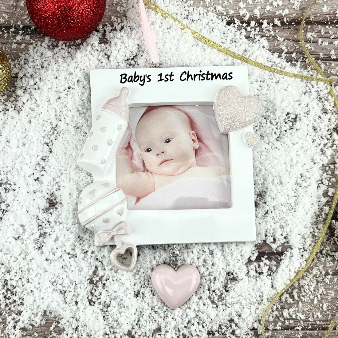 Baby's First Picture Frame Christmas Ornament in Pink from MyOrnament. 