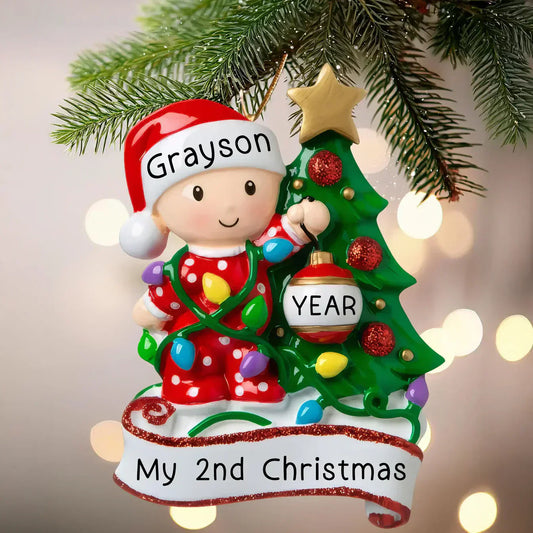Personalized “My 2nd Christmas” ornament with a child’s name, glowing holiday lights, and a decorated Christmas tree.