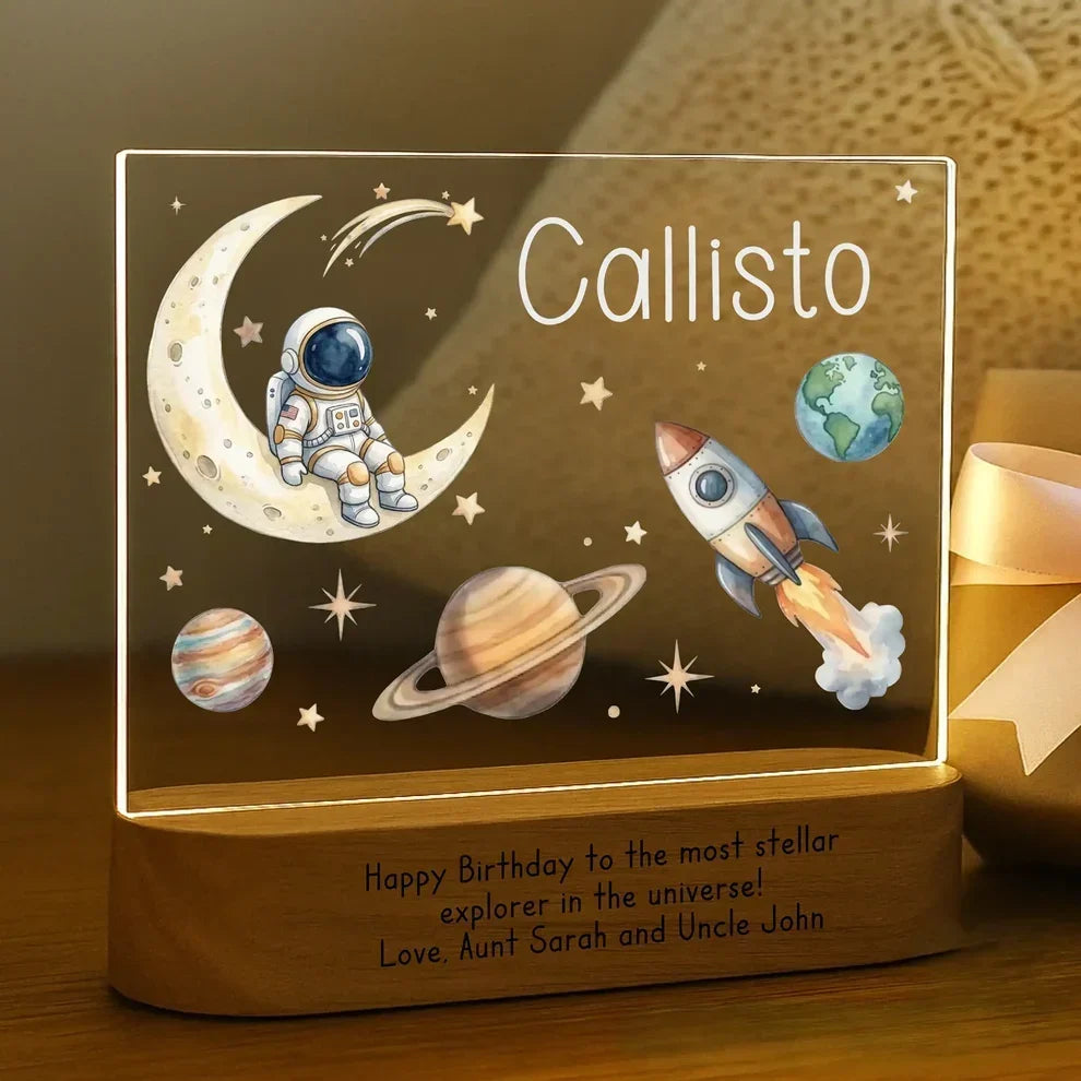 MyOrnament personalized baby night light with moon, stars, astronaut, and rocket design, customized with a child’s name.