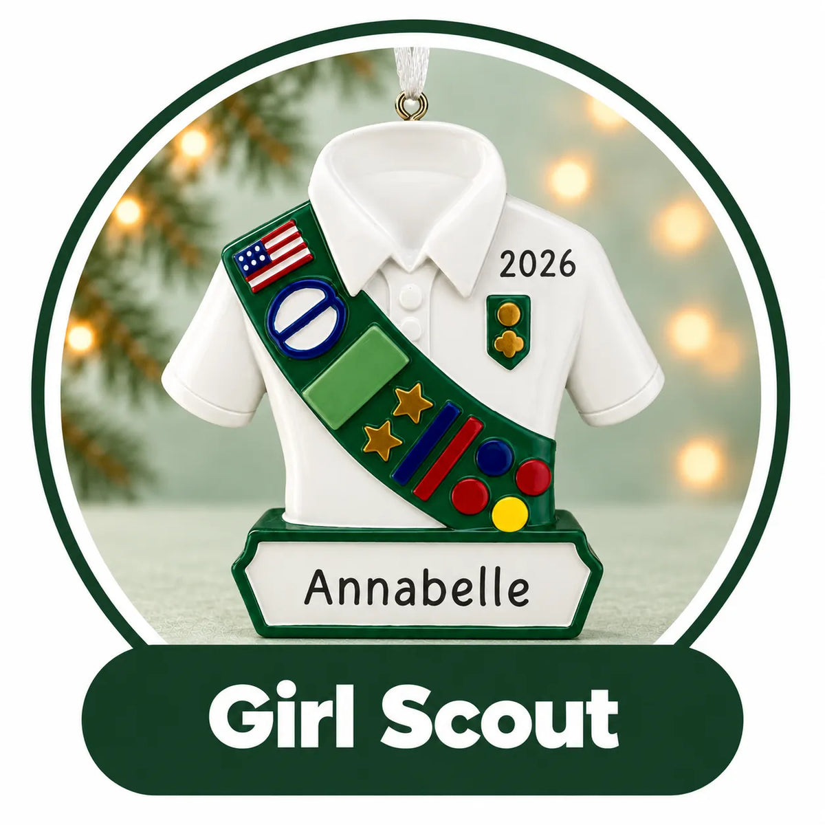 Personalized Girl Scout Christmas ornament: white uniform shirt with a green badge sash, custom name and year