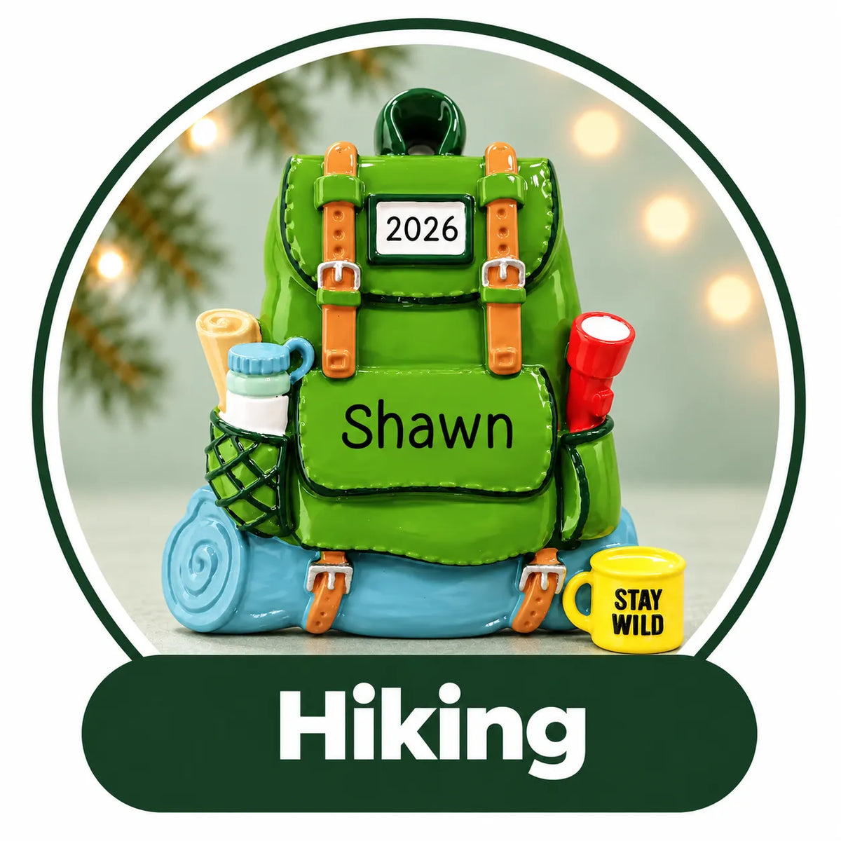 Personalized hiking Christmas ornament: green backpack with bedroll, lantern and Stay Wild mug, custom name and year