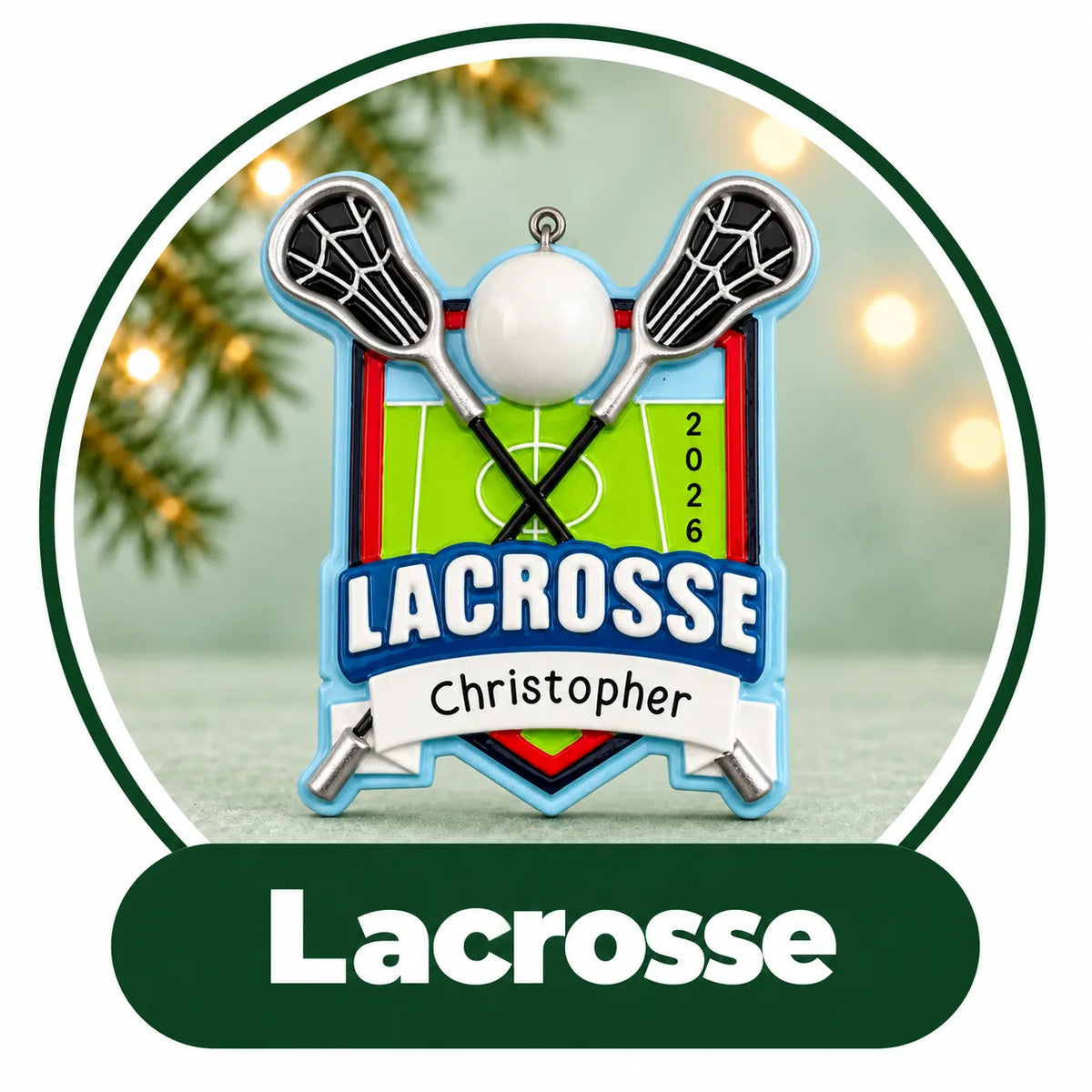 Personalized lacrosse Christmas ornament: crossed sticks and ball over a field shield with custom name and year