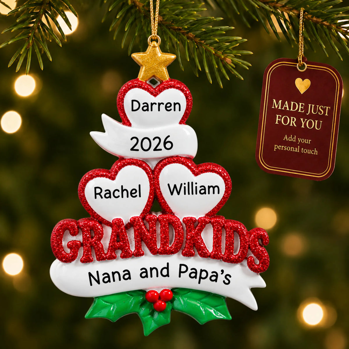 Grandkids 3 hearts christmas ornament hanging on a lit Christmas tree with a Made Just For You gift tag