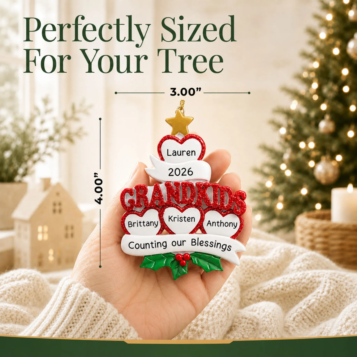 Size guide: the personalized grandkids 4 hearts christmas ornament is 3.00 in wide by 4.00 in tall, shown in hand