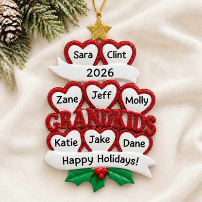 Personalized grandkids 8 hearts christmas ornament laid on a soft white knit blanket