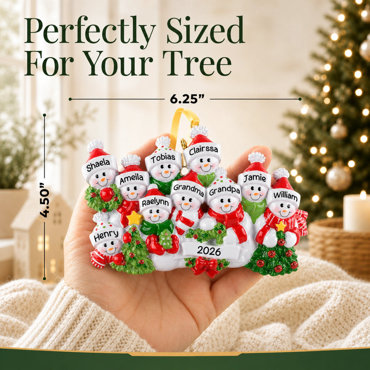 Personalized snowman family of 10 Christmas ornament held in hand, about 6 inches wide for your tree