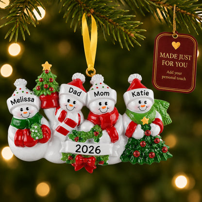 Personalized snowman family of 4 christmas ornament hanging on a tree, made just for you