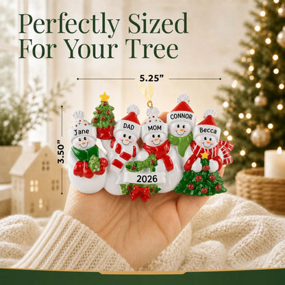 Size guide: the personalized snowman family of 5 christmas ornament is 5.25 in wide by 3.50 in tall, shown in hand