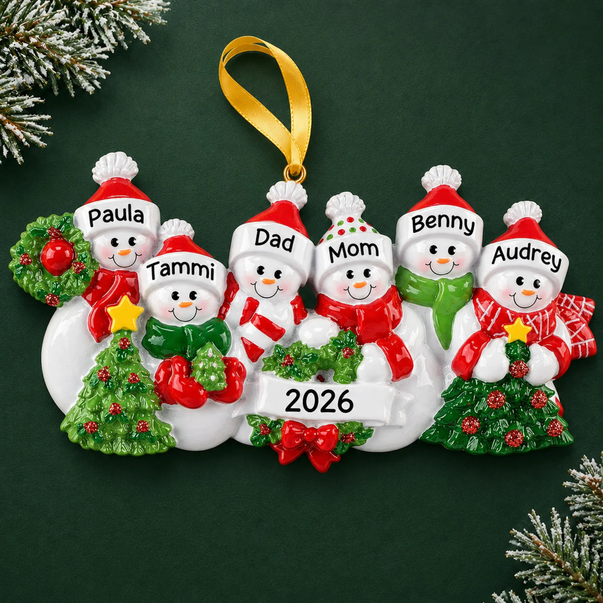 Personalized snowman family of 6 christmas ornament on a dark green pine background