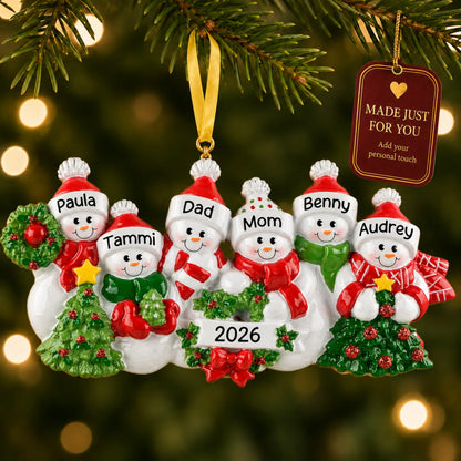 Snowman family of 6 christmas ornament hanging on a lit Christmas tree with a Made Just For You gift tag