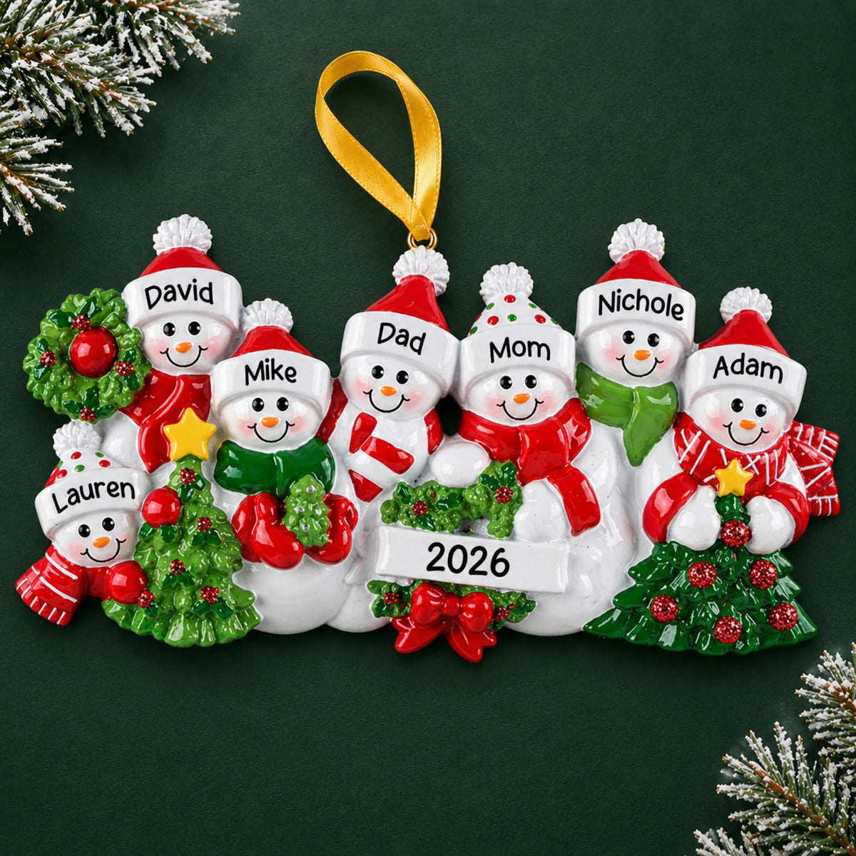Personalized snowman family of 7 christmas ornament on a dark green pine background