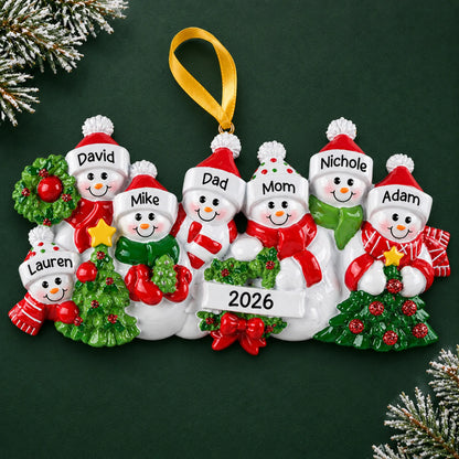 Personalized snowman family of 7 christmas ornament on a dark green pine background