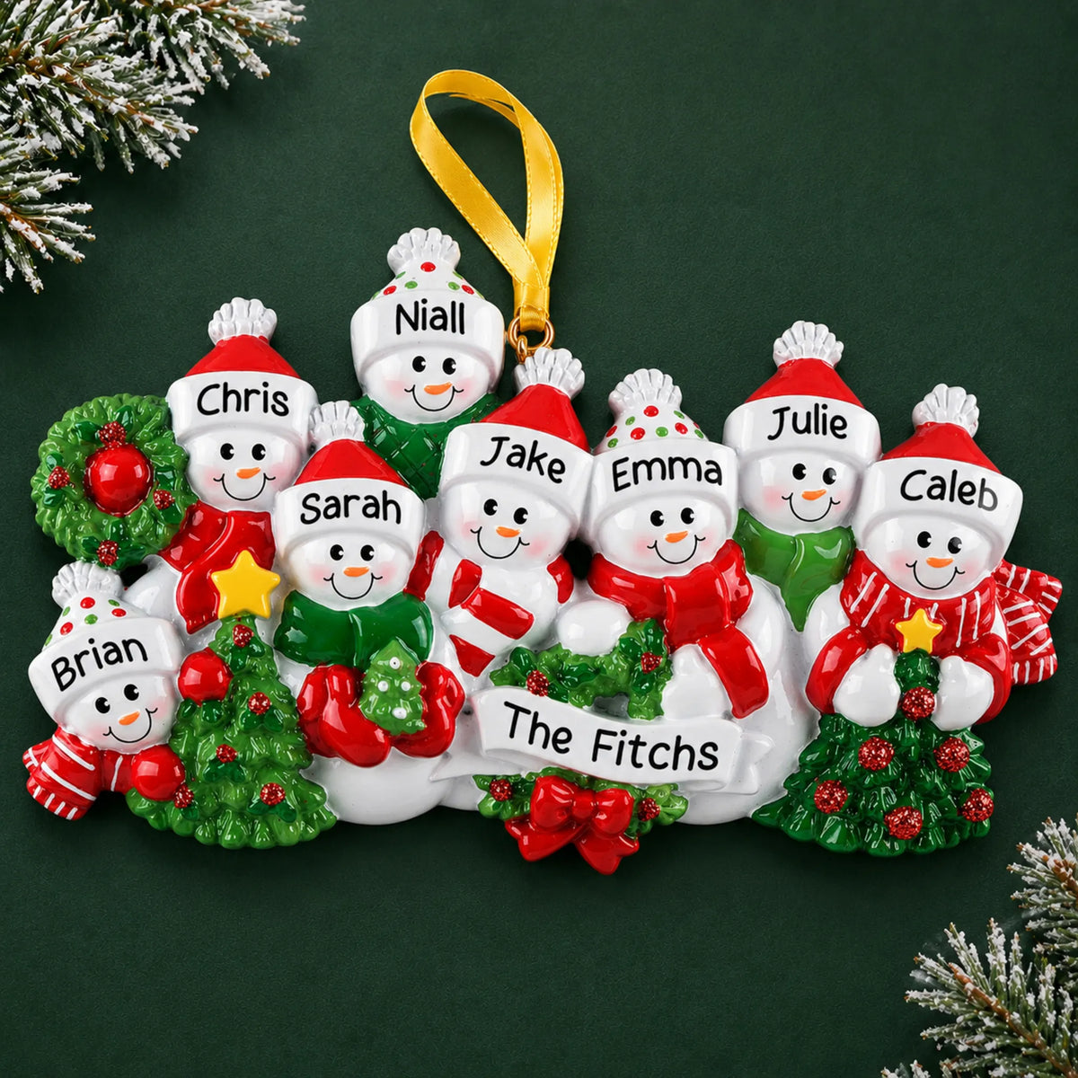 Personalized snowman family of 8 christmas ornament on a dark green pine background