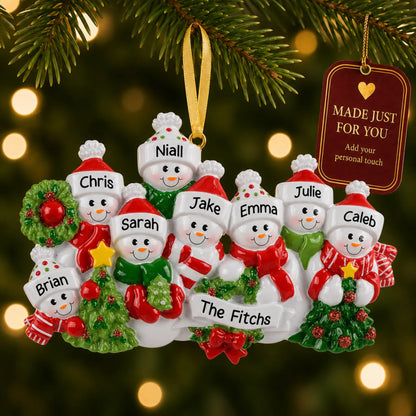 Snowman family of 8 christmas ornament hanging on a lit Christmas tree with a Made Just For You gift tag