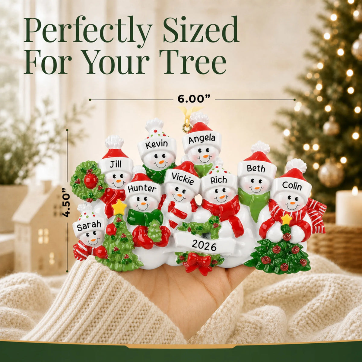 Size guide: the personalized snowman family of 9 christmas ornament is 6.00 in wide by 4.50 in tall, shown in hand