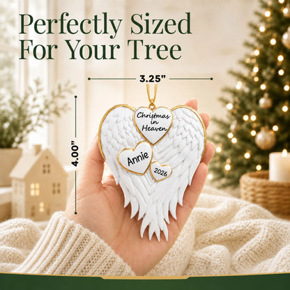 Size guide: the personalized Christmas In Heaven Memorial christmas ornament shown in hand next to a Christmas tree