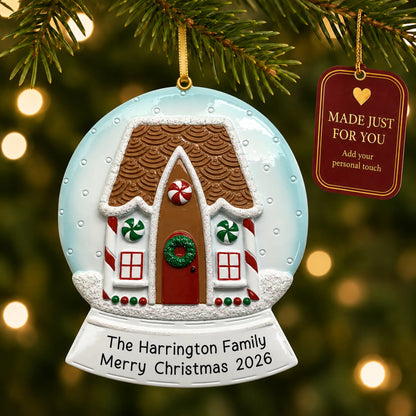 Gingerbread House Snow Globe christmas ornament hanging on a lit Christmas tree with a Made Just For You gift tag
