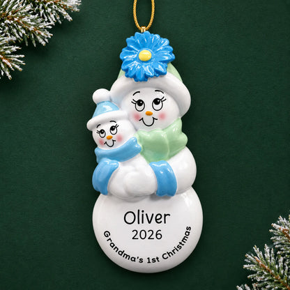 Personalized grandma's 1st christmas ornament on a dark green pine background