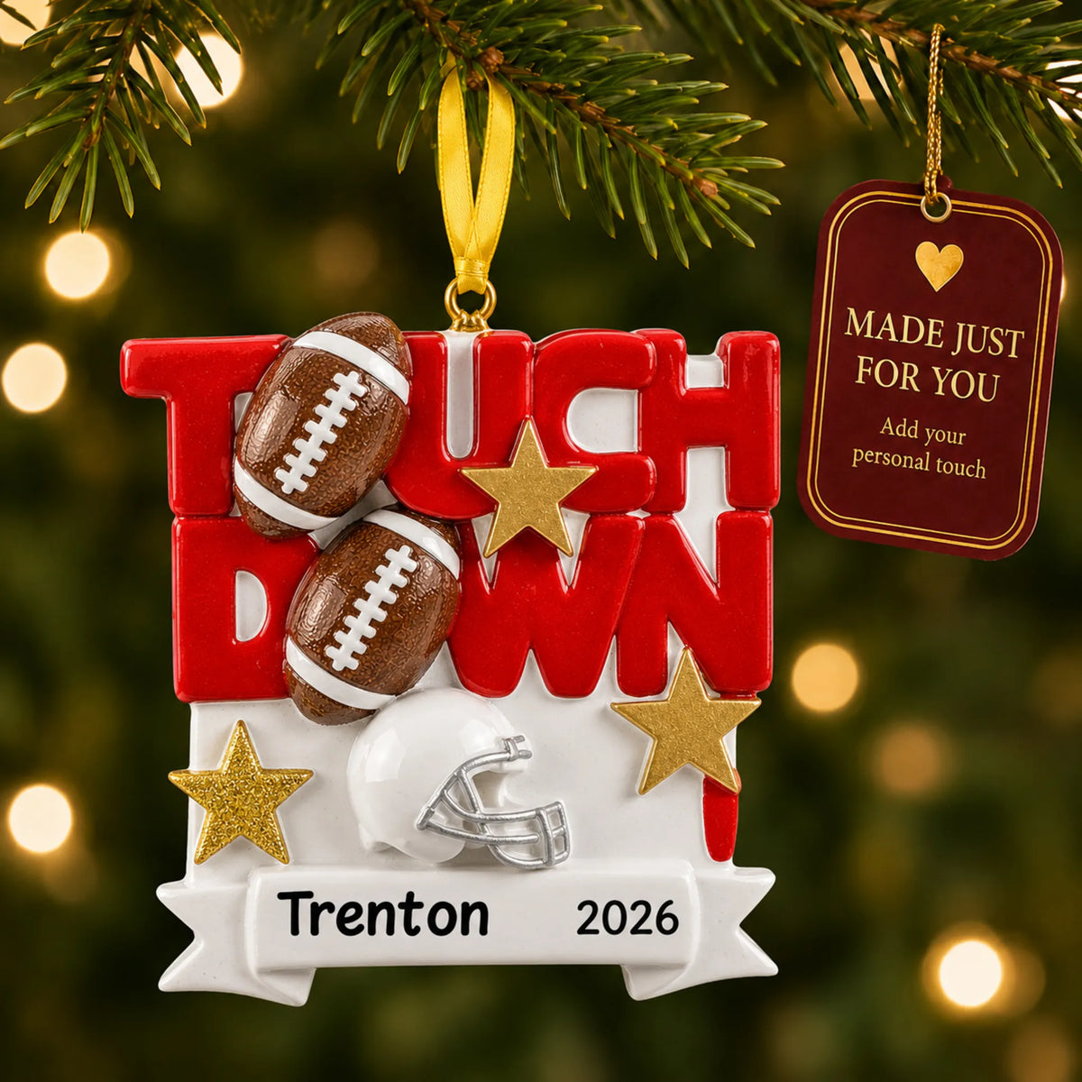 Football touchdown christmas ornament hanging on a lit Christmas tree with a Made Just For You gift tag