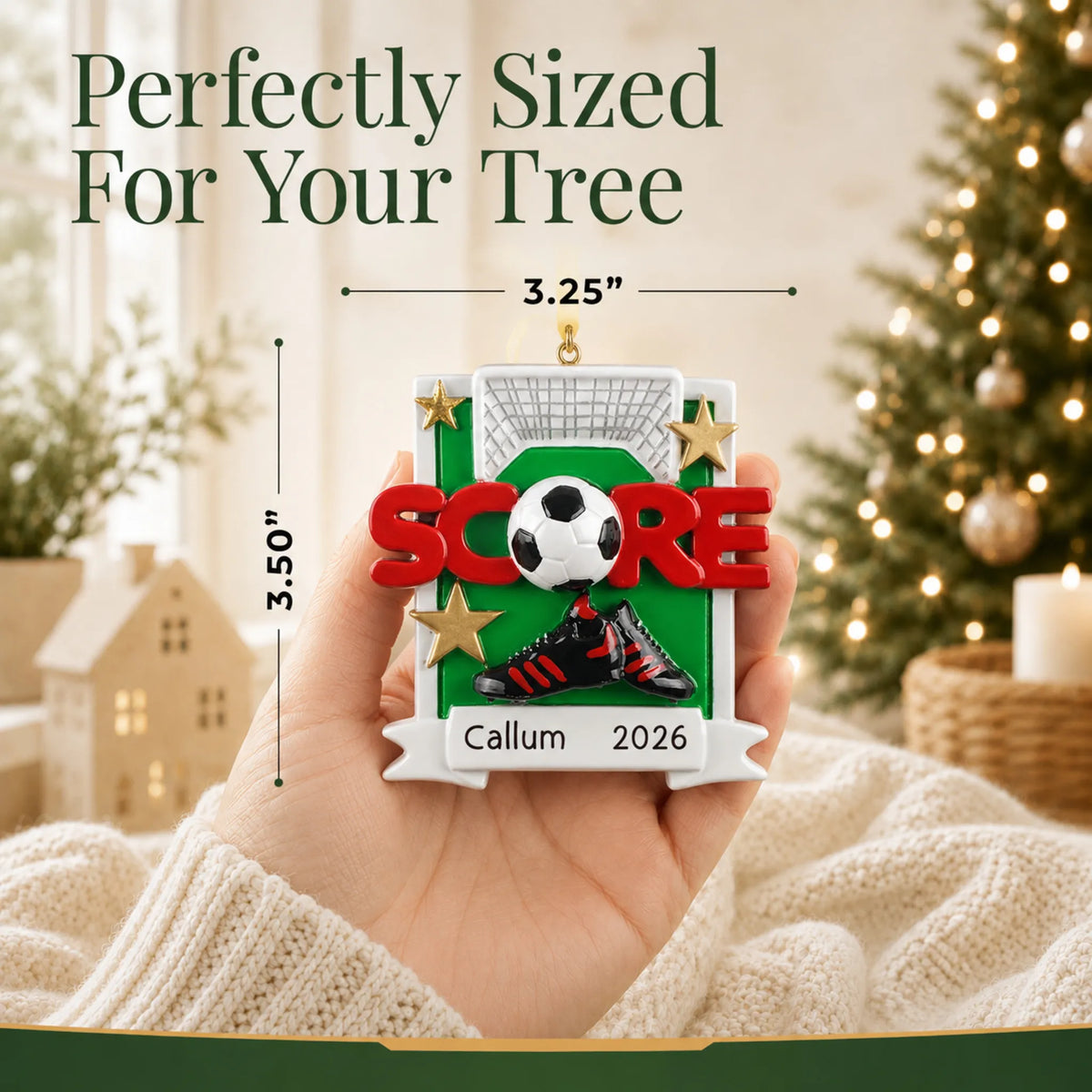 Size guide: the personalized soccer score christmas ornament is 3.25 in wide by 3.50 in tall, shown in hand