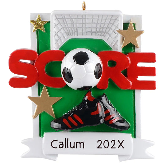 Personalized soccer ornament with ball, cleats, gold stars, and the word SCORE, customized with name and year.