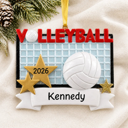 Personalized volleyball banner christmas ornament laid on a soft white knit blanket