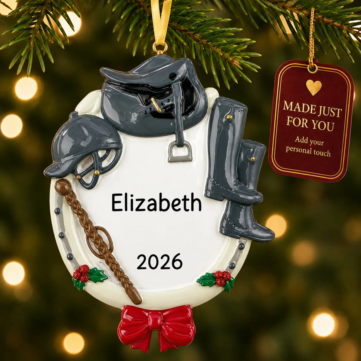 Equestrian horse riding christmas ornament hanging on a lit Christmas tree with a Made Just For You gift tag