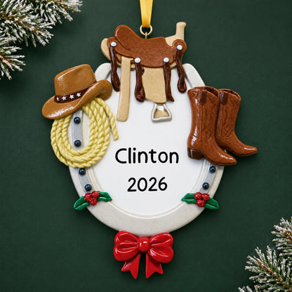 Personalized cowboy western christmas ornament on a dark green pine background