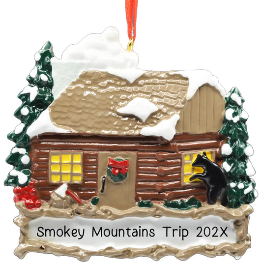 Personalized log cabin ornament with snowy wooden scene. Features banner for name and year or a message. 