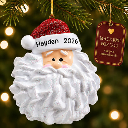 Santa Glitter Beard christmas ornament hanging on a lit Christmas tree with a Made Just For You gift tag