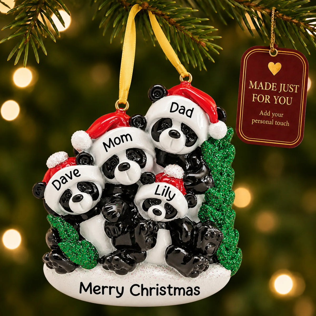 Panda family of 4 christmas ornament hanging on a lit Christmas tree with a Made Just For You gift tag