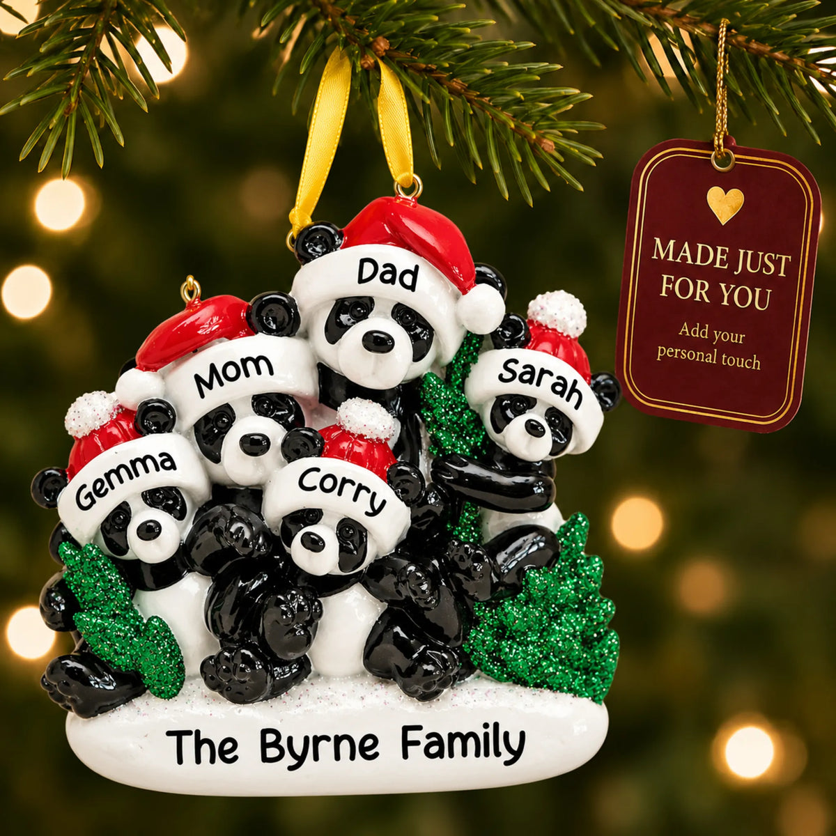Panda family of 5 christmas ornament hanging on a lit Christmas tree with a Made Just For You gift tag
