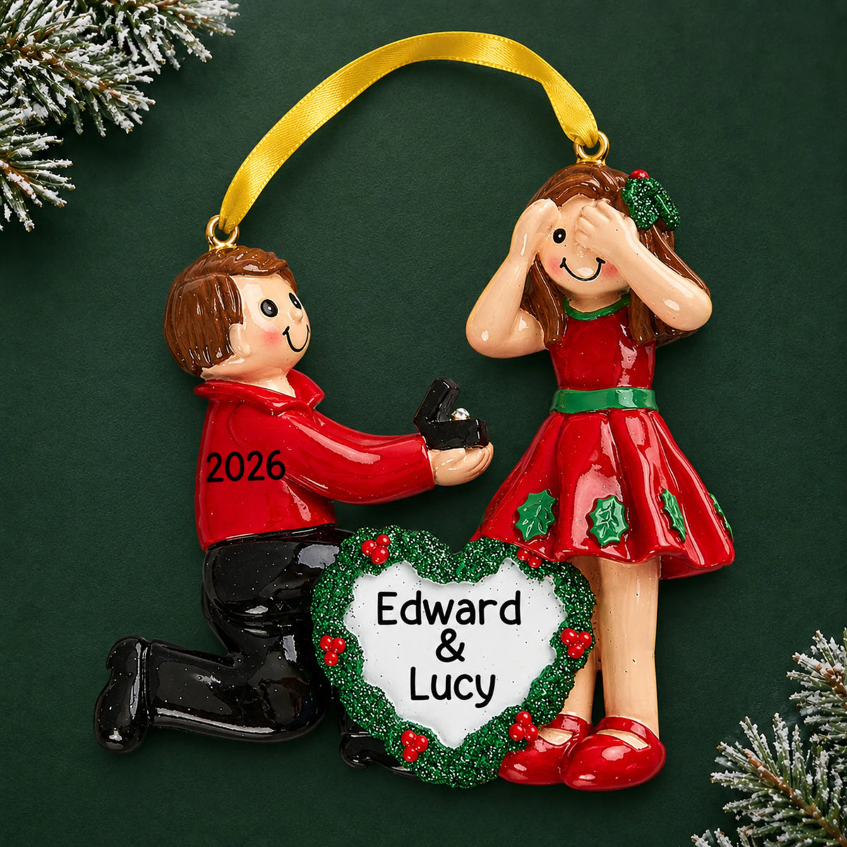 Personalized Proposing Couple christmas ornament on a dark green pine background