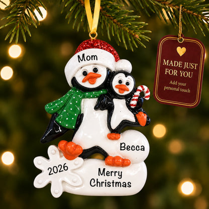 Personalized single parent penguin with child christmas ornament on a tree, made just for you