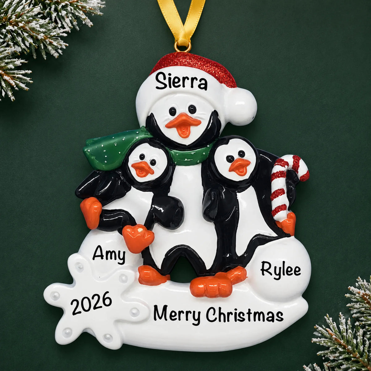 Personalized single parent penguin with 2 kids christmas ornament on a dark green pine background