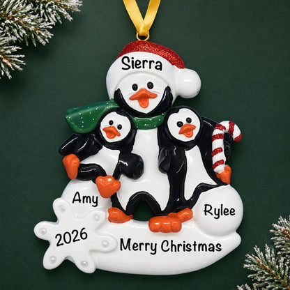 Personalized single parent penguin with 2 kids christmas ornament on a dark green pine background