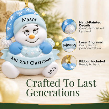 Hand-painted details and laser engraved personalization on the baby boy 2nd christmas snowman ornament, ribbon included