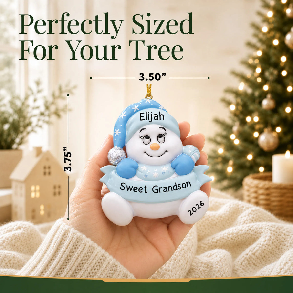 Size guide: the personalized grandson snowman christmas ornament is 3.50 in wide by 3.75 in tall, shown in hand