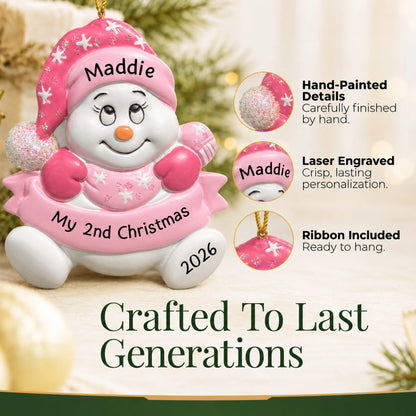 Hand-painted details and laser engraved personalization on the baby girl 2nd christmas snowman ornament, ribbon included