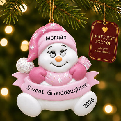 Granddaughter pink snowman christmas ornament hanging on a lit Christmas tree with a Made Just For You gift tag