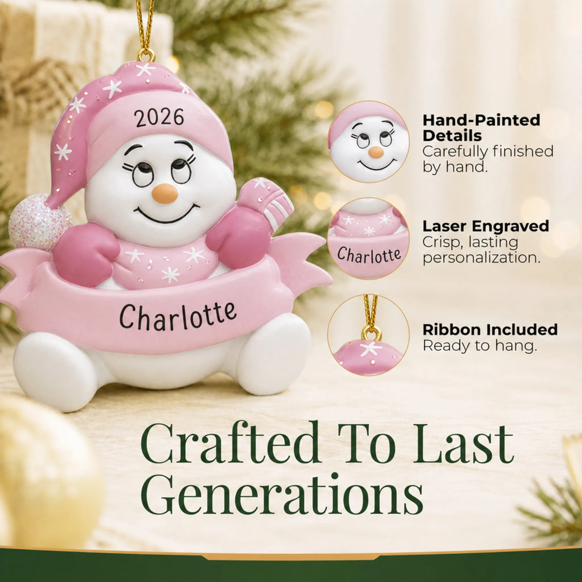 Hand-painted details and laser engraved personalization on the baby girl pink snowbaby christmas ornament, ribbon included