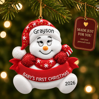 Red baby's 1st christmas snowman ornament hanging on a lit Christmas tree with a Made Just For You gift tag
