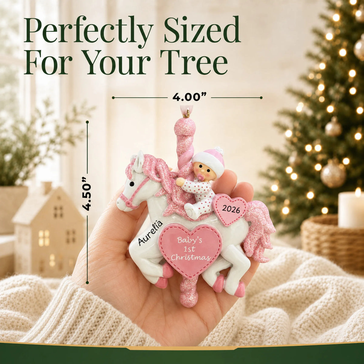 Size guide: the personalized pink baby's 1st christmas carousel ornament is 4.00 in wide by 4.50 in tall, shown in hand