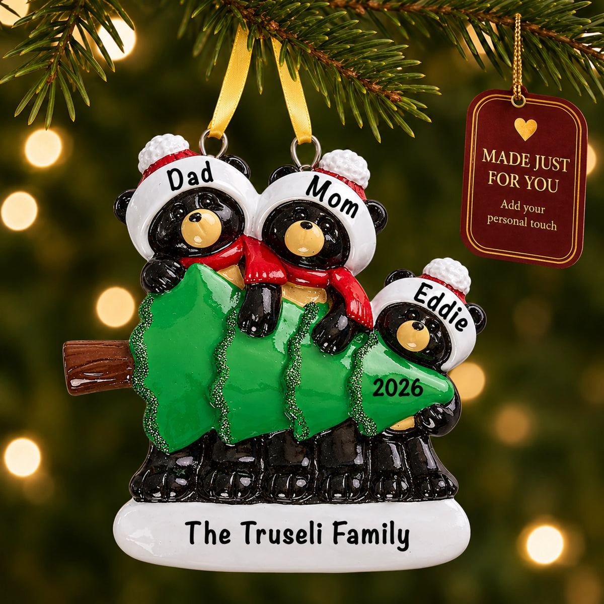 Personalized black bear family of 3 ornament on a tree with a Made Just For You gift tag
