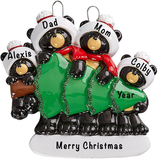Personalized black bear family of 4 Christmas ornament by a green tree with four names and a greeting