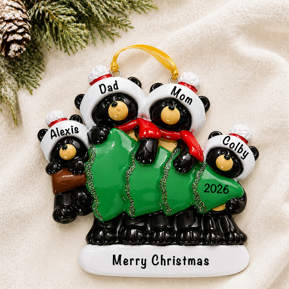 Personalized black bear family of 4 Christmas ornament with four names and 2026 on a holiday tree
