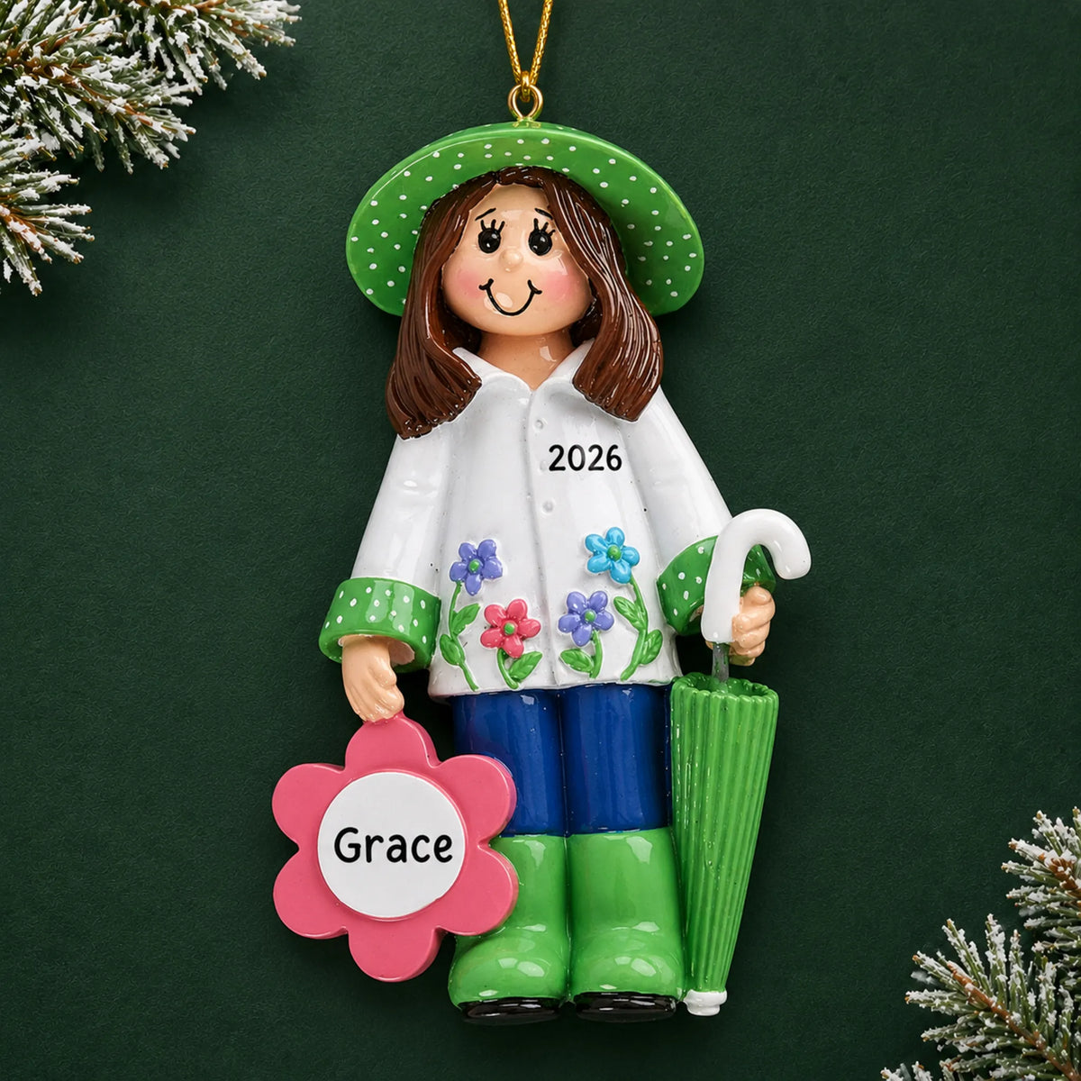 Personalized gardening christmas ornament on a dark green pine background