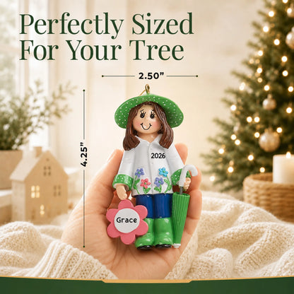 Size guide: the personalized gardening christmas ornament is 2.50 in wide by 4.25 in tall, shown in hand