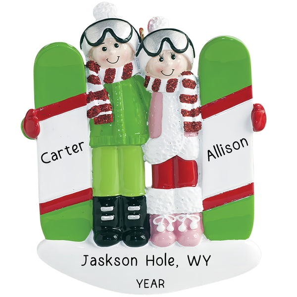 Adorno navideño de pareja de snowboarders 